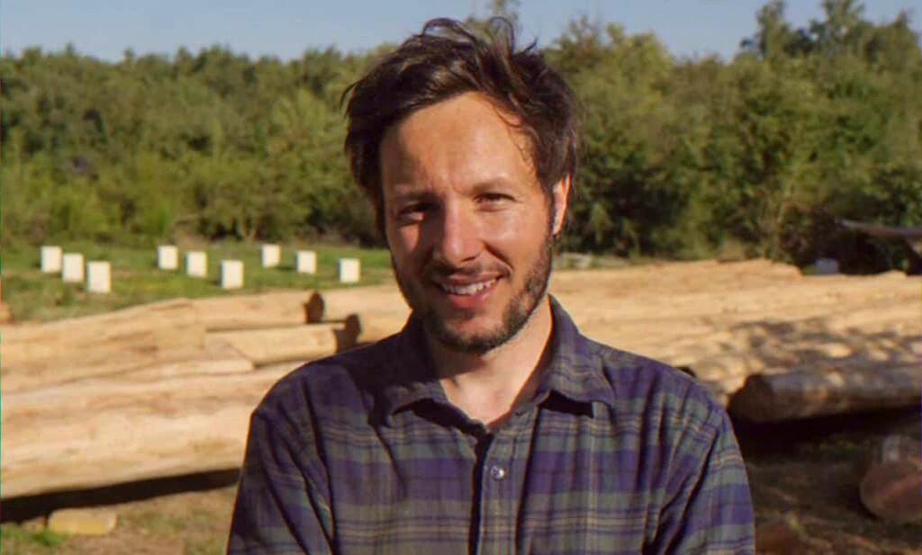 musician building a cabin refuge to compose and prioritise family life