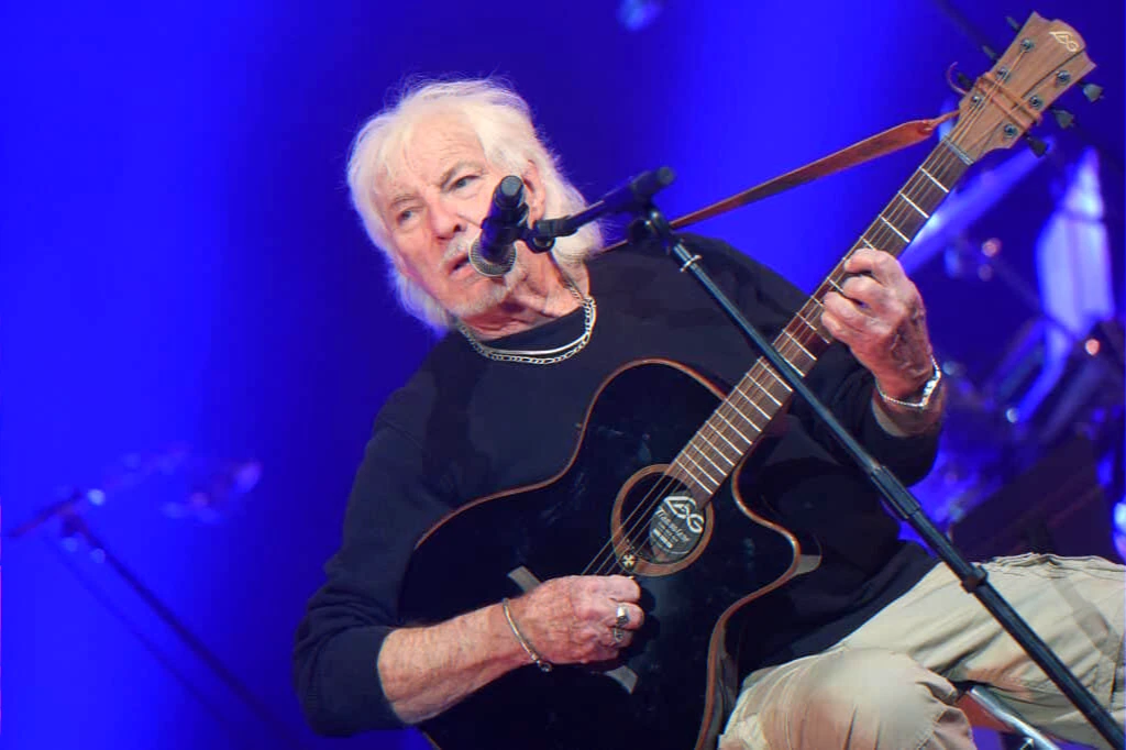 classic French singer on tour promoting an autobiography and a world-record bid