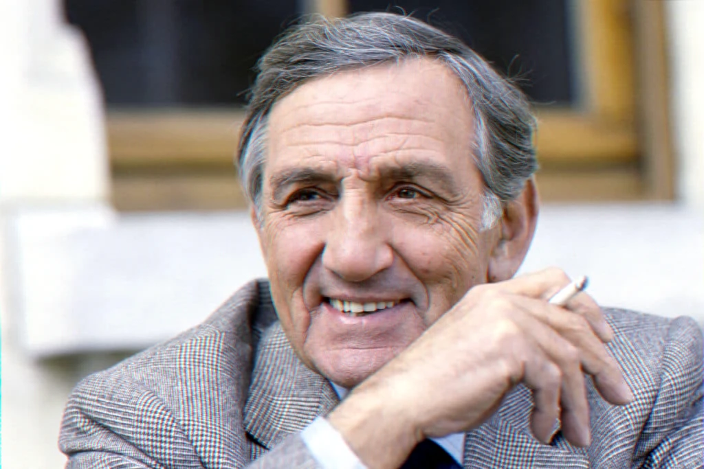 Portrait d'une icône du cinéma français illustrant un dossier sur l'héritage artistique, l'engagement humanitaire et une querelle successorale