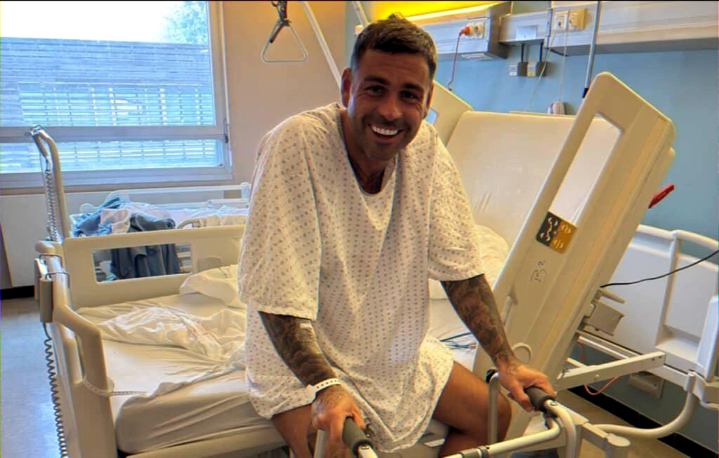 Motorcycle accident patient in hospital with ankle injury; claims vehicle crossed double white lines, prompting renewed legal scrutiny