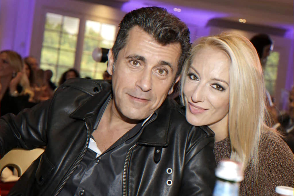 Obituary coverage: widow's tribute and private funeral arrangements