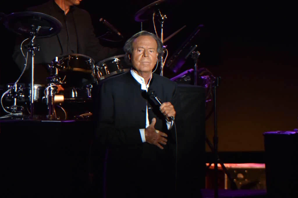 renowned singer denies recent accusations as archival videos resurface