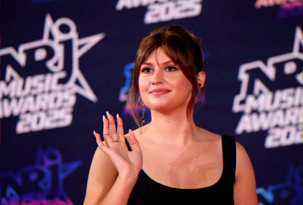 Olympia concert scene linked to Star Academy winner's platinum record, NRJ Music Awards recognition and tour announcement