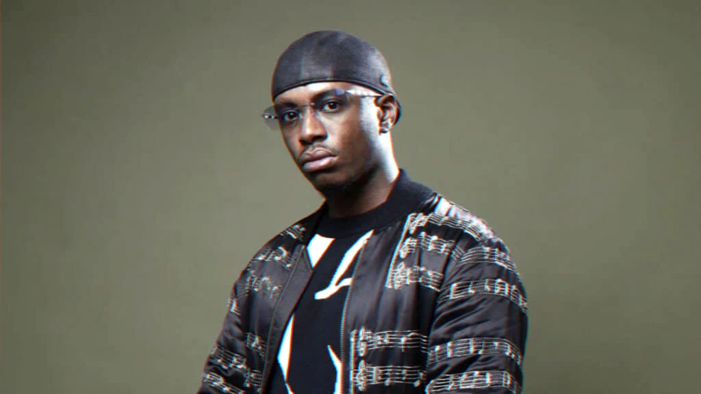 Portrait used for coverage of a tribute concert and related organizational tensions