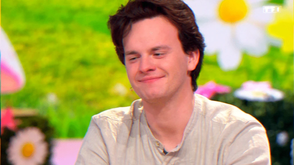 Contestant emotional farewell on a game show