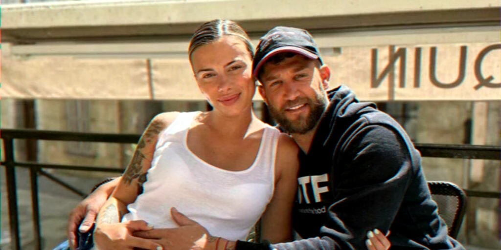 Joint baptism celebration for two daughters, highlighting co‑parenting and family unity