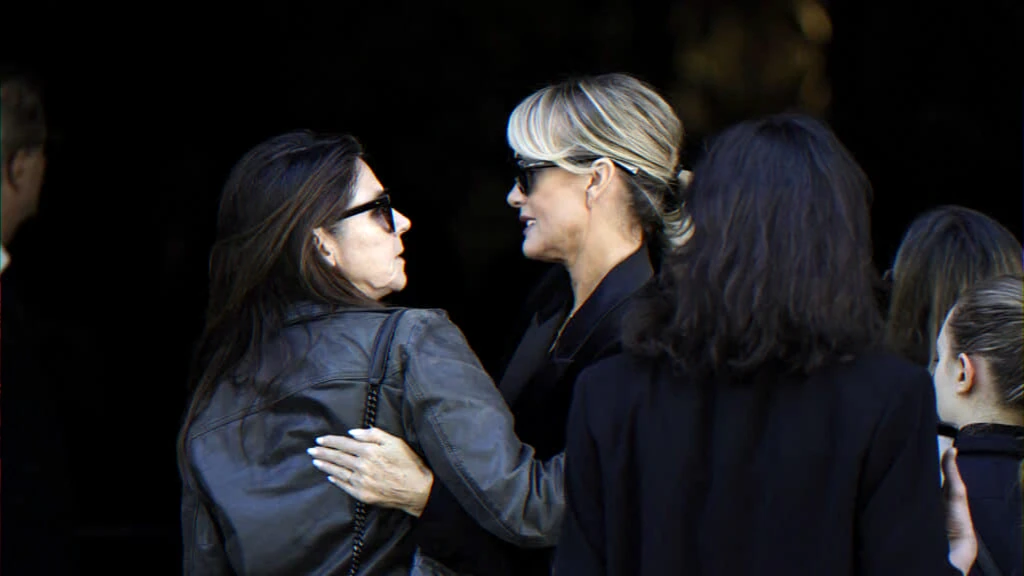 Simultaneous funerals highlight family tensions and public tributes