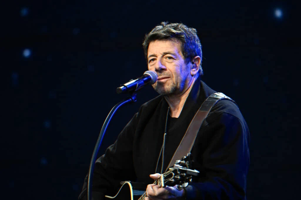 musician on stage amid reopened sexual assault investigation
