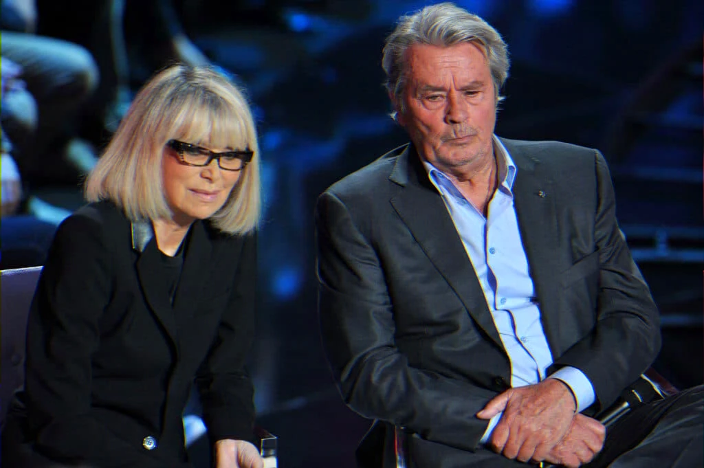 Two renowned cinema figures at an event, used to illustrate a feature on their Paris triplex and Aix-en-Provence hôtel particulier