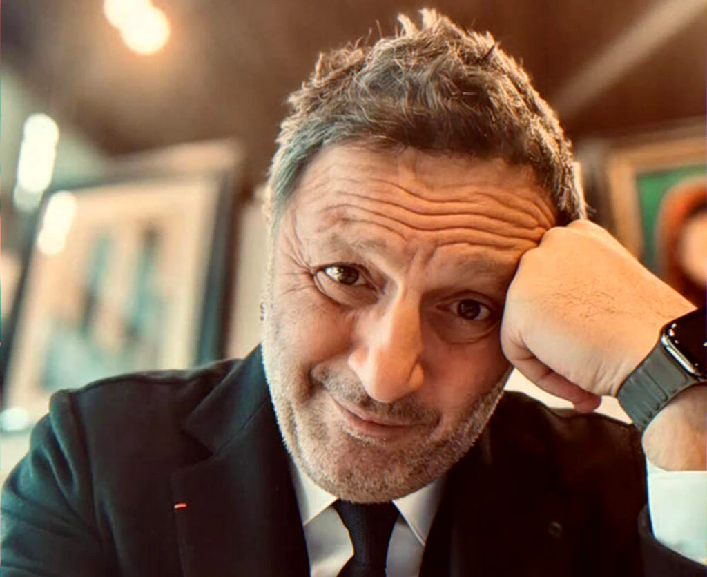 Editorial portrait for article on a publisher crisis and an author confirming a 27 May book release