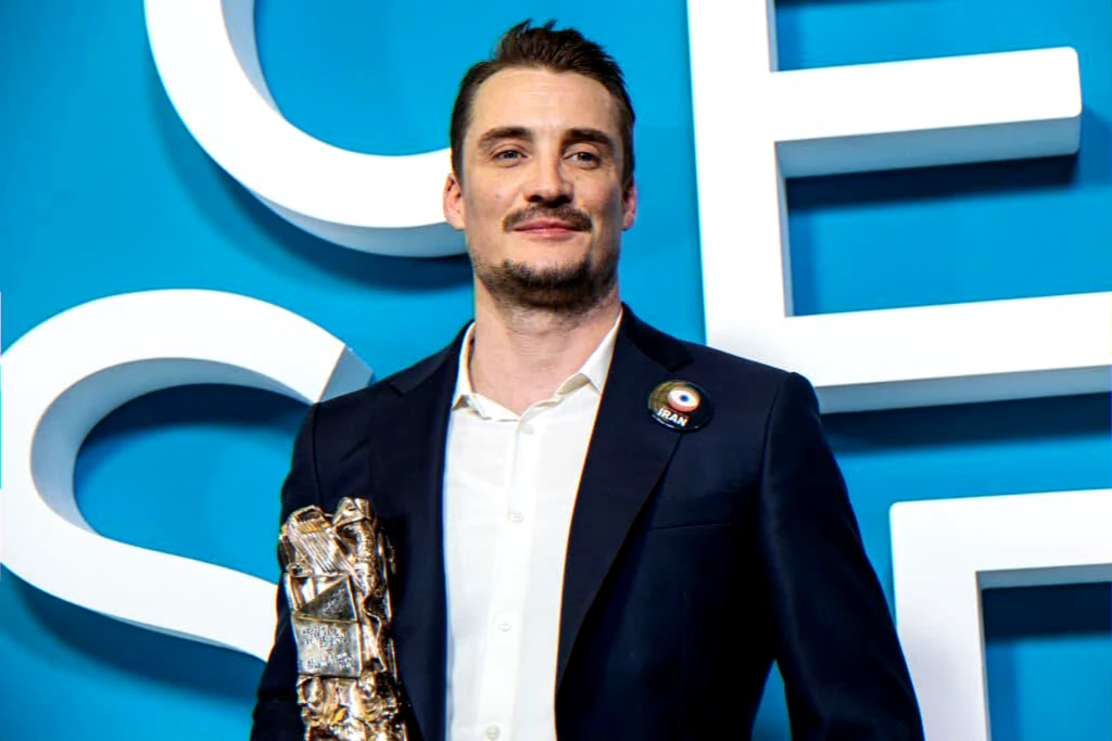 actor-holding-award-at-film-event-linked-to-biopic-announcement